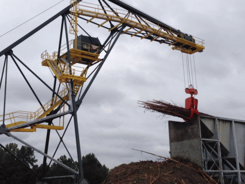 125’ Crane Unloading Trucks and Feeding A Chute